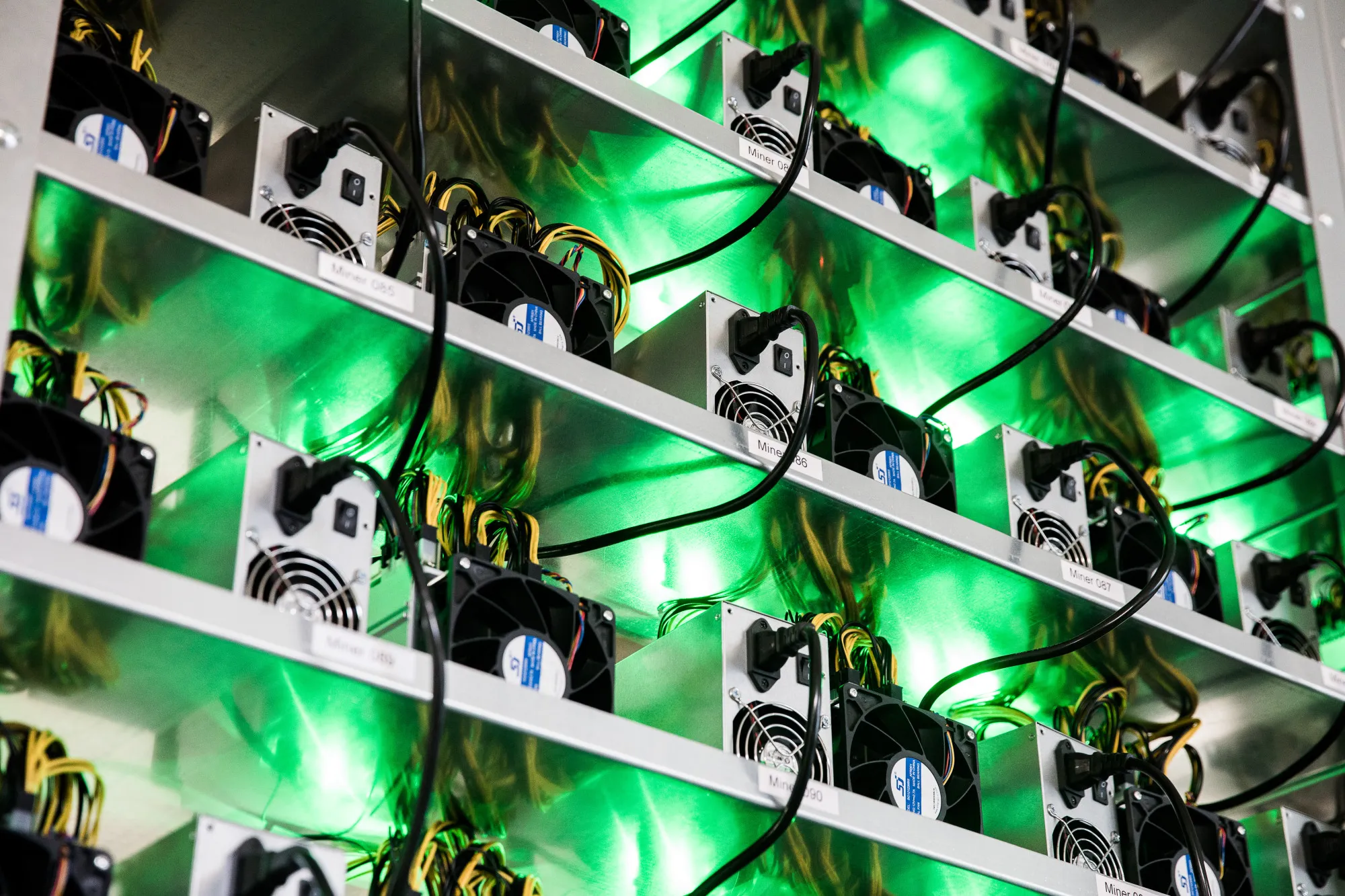 Cryptocurrency mining rigs composed of Antminer S9 ASIC machines operate on racks at the HydroMiner GmbH cryptocurrency mining facility near Waidhofen an der Ybbs, Austria.