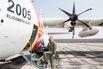 Commander Gabrielle McGrath entering the aircraft where she and her team conduct their missions to search for icebergs in the North Atlantic. Using HC-130J aircraft, their operations are based out of St. John’s, Newfoundland, for a nine-day period twice a month.
