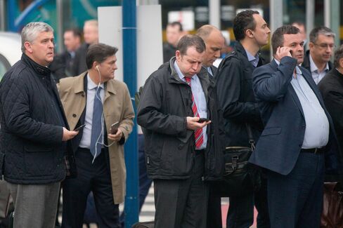 Commuters outside London City Airport