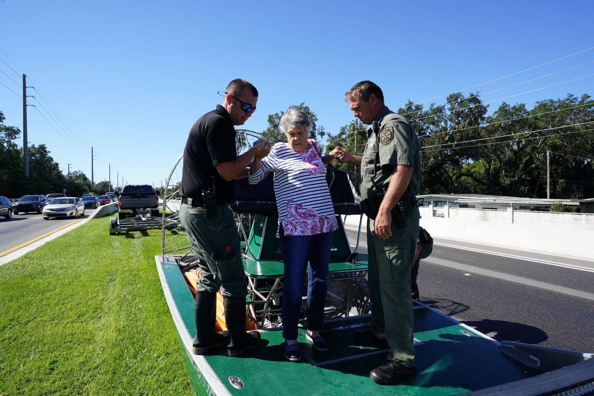 Osceola County Sheriffs use a fanboat to rescue a 93-year-old resident from flooding following Hurricane Ian on Sept.&nbsp;30.