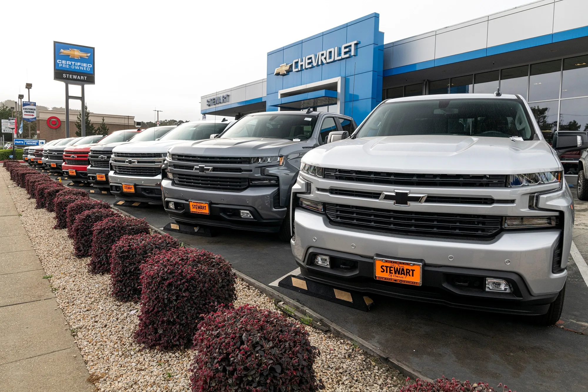 Chevrolet Silverados at a car dealership in Colma, California