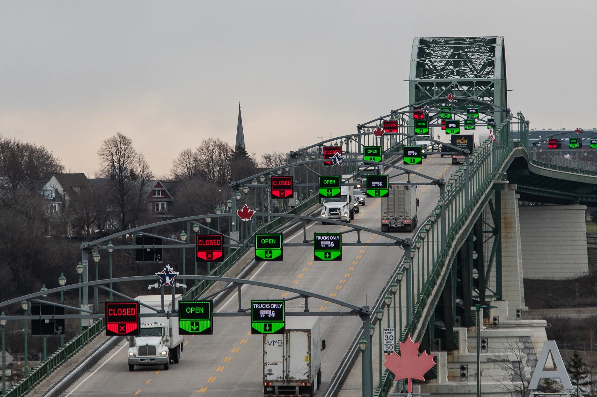 Trucks cross the Peace Bridge at the Canada-US border in Fort Erie, Ontario, Canada.