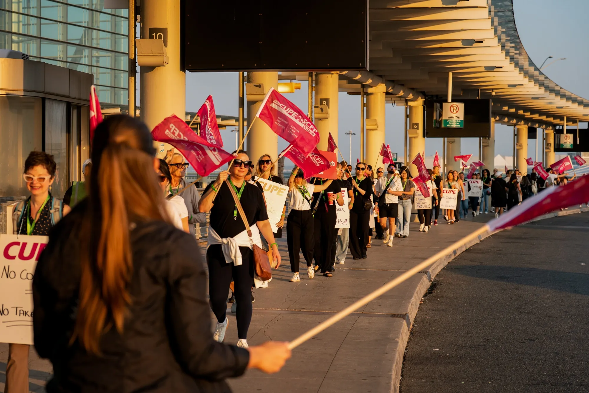 Air Canada flight attendants and supporters during a strike at Toronto Pearson International Airport in Mississauga, Ontario, on Aug. 16.