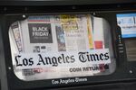 A Los Angeles Times newspapers vending machine is seen in downtown Los Angeles, California.