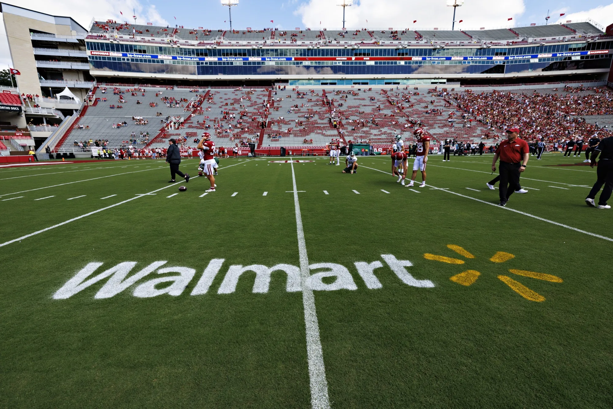 The Walmart logo painted on the field before a game between the Arkansas Razorbacks and the UAB Blazers at Donald W. Reynolds Razorback Stadium in 2024.