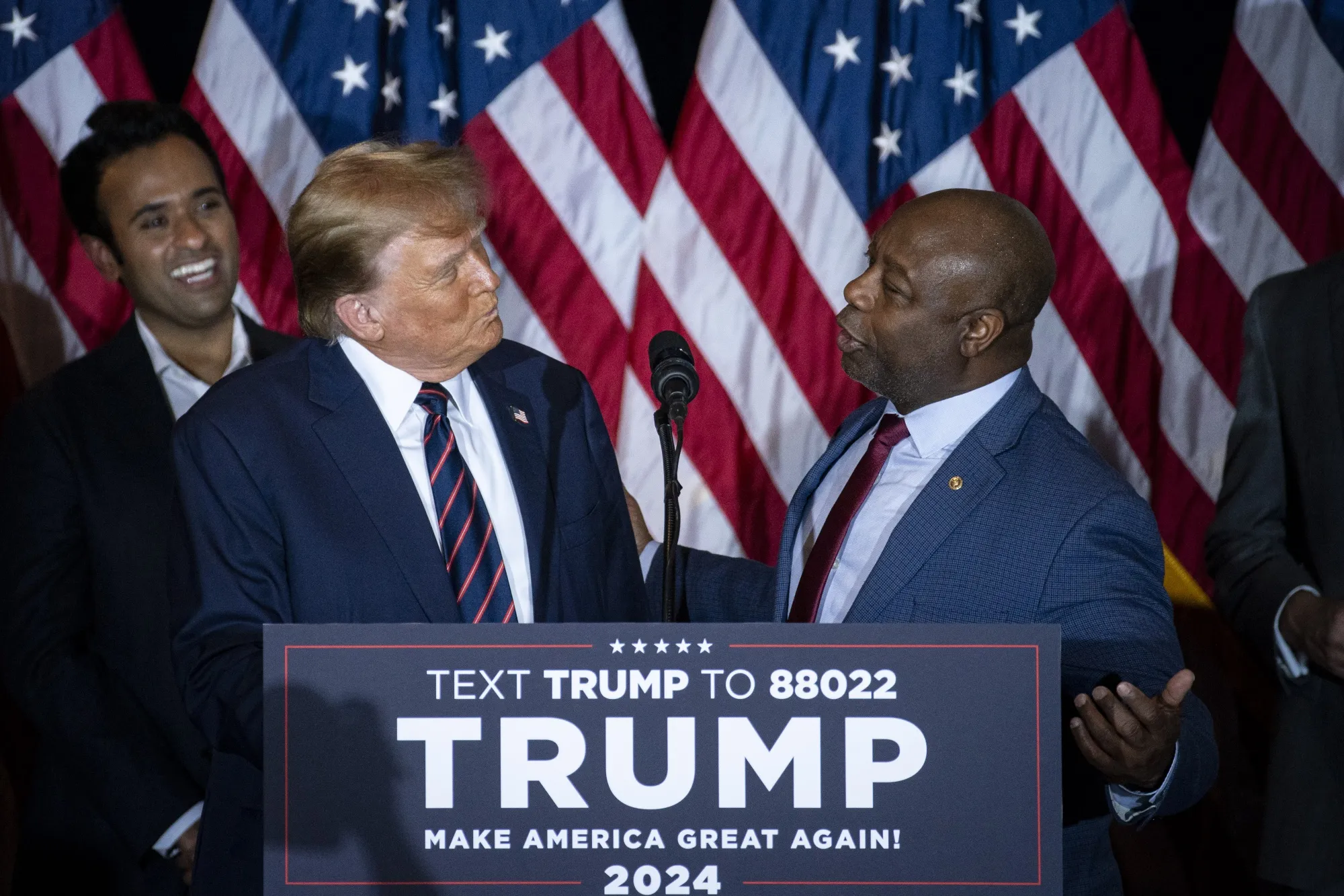 Tim Scott, right, and Donald Trump during a New Hampshire primary election night watch party in Nashua, New Hampshire, on Jan. 23.