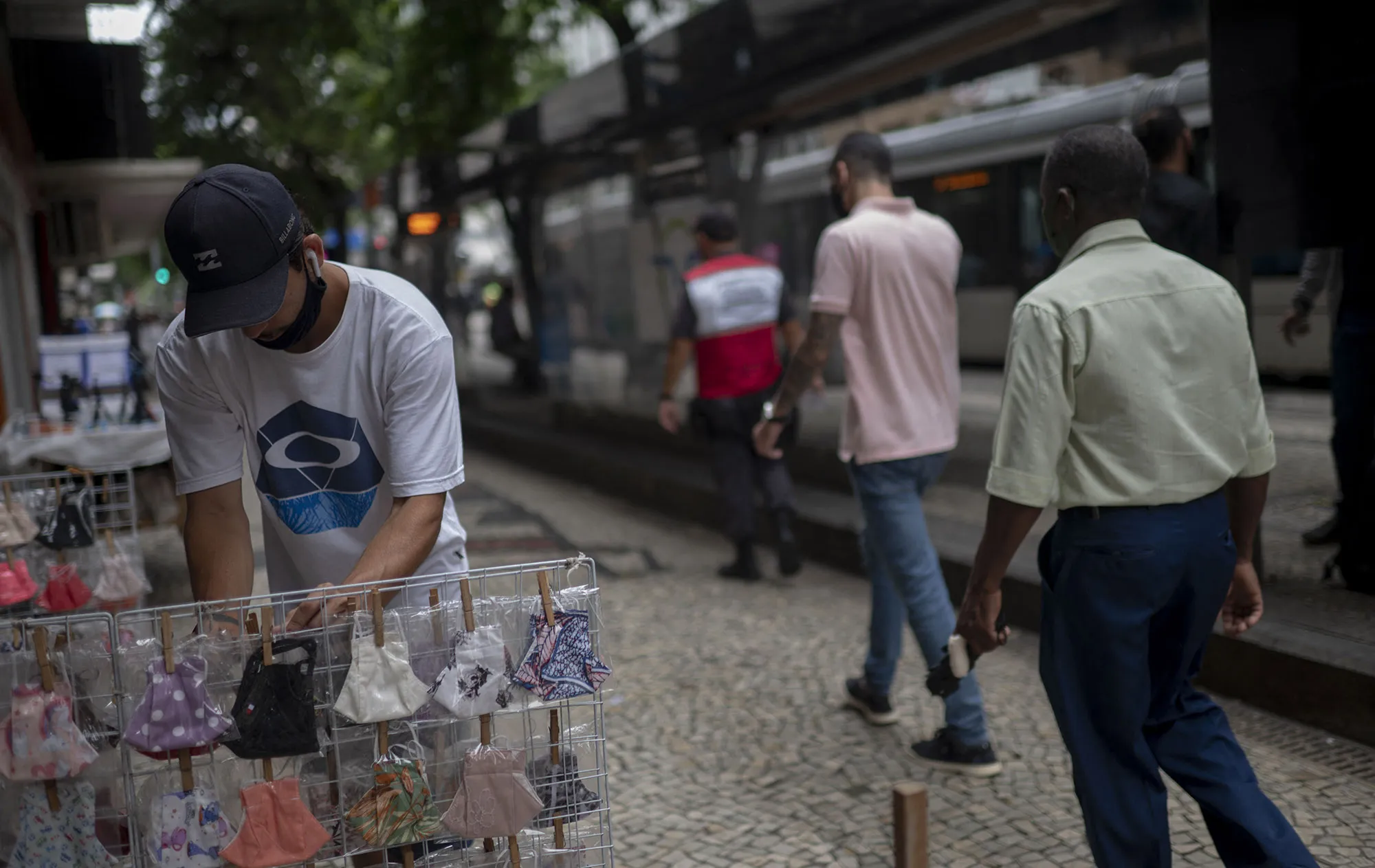 A streetseller sells&nbsp;facemasks his stand at the Rio Branco Avenue in downtown Rio de Janeiro.