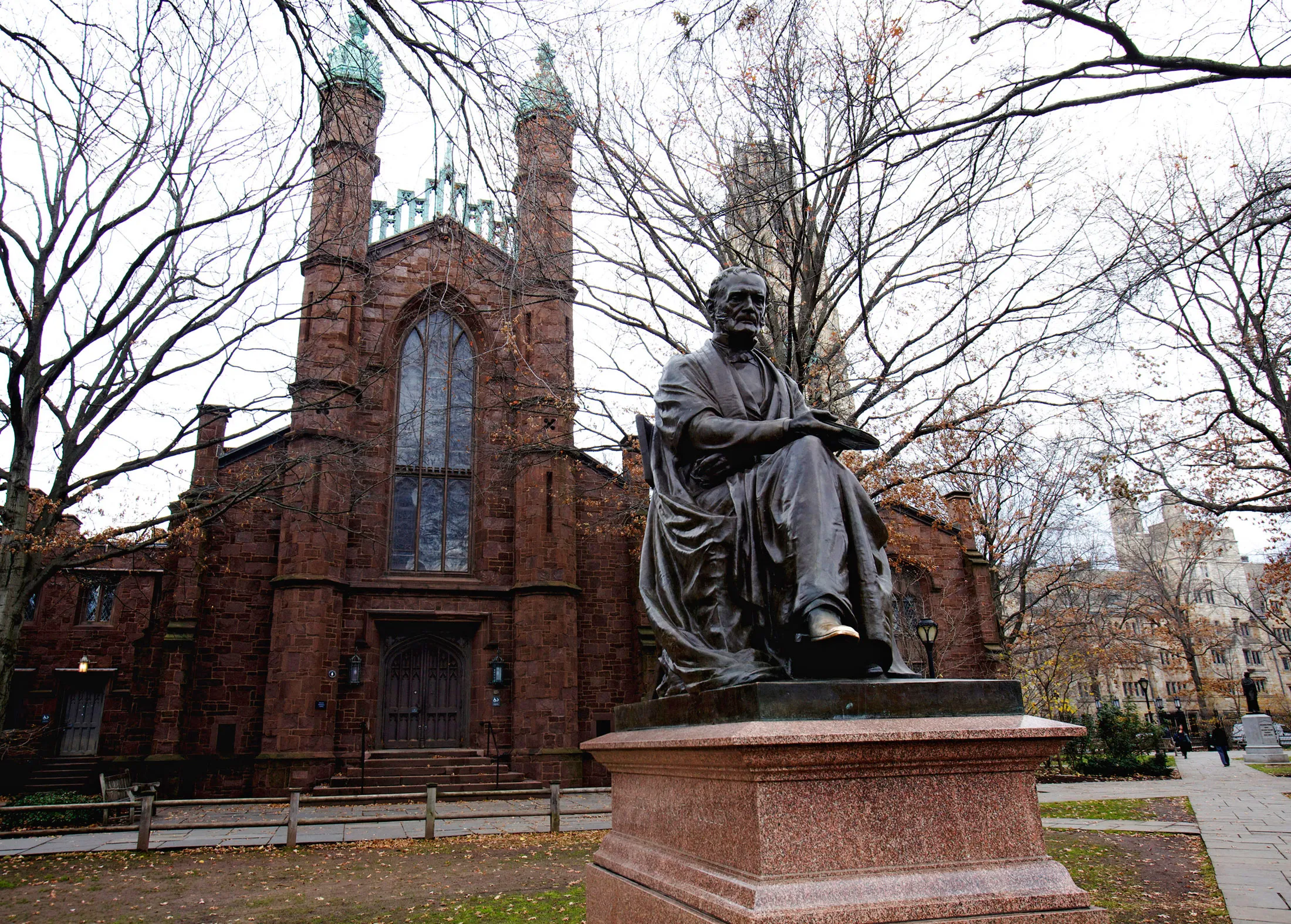 The Theodore Dwight Woolsey statue in front of Dwight Hall on the Old Campus at Yale University in New Haven, Connecticut.
