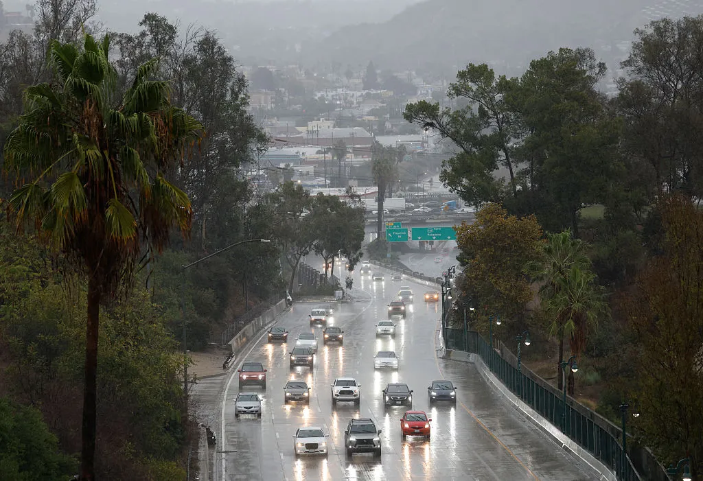 Motorists drive toward downtown during a powerful atmospheric river storm in Los Angeles, last month.