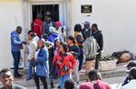 Sub-Saharan migrants gather at the Ivory Coast embassy in Tunis on Feb. 28.