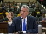 New York City Mayor Bill de Blasio testifies during a state Senate Education Committee hearing.