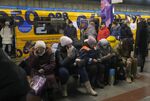 People take shelter inside a metro station during air raid alert in Kyiv on Dec. 16.