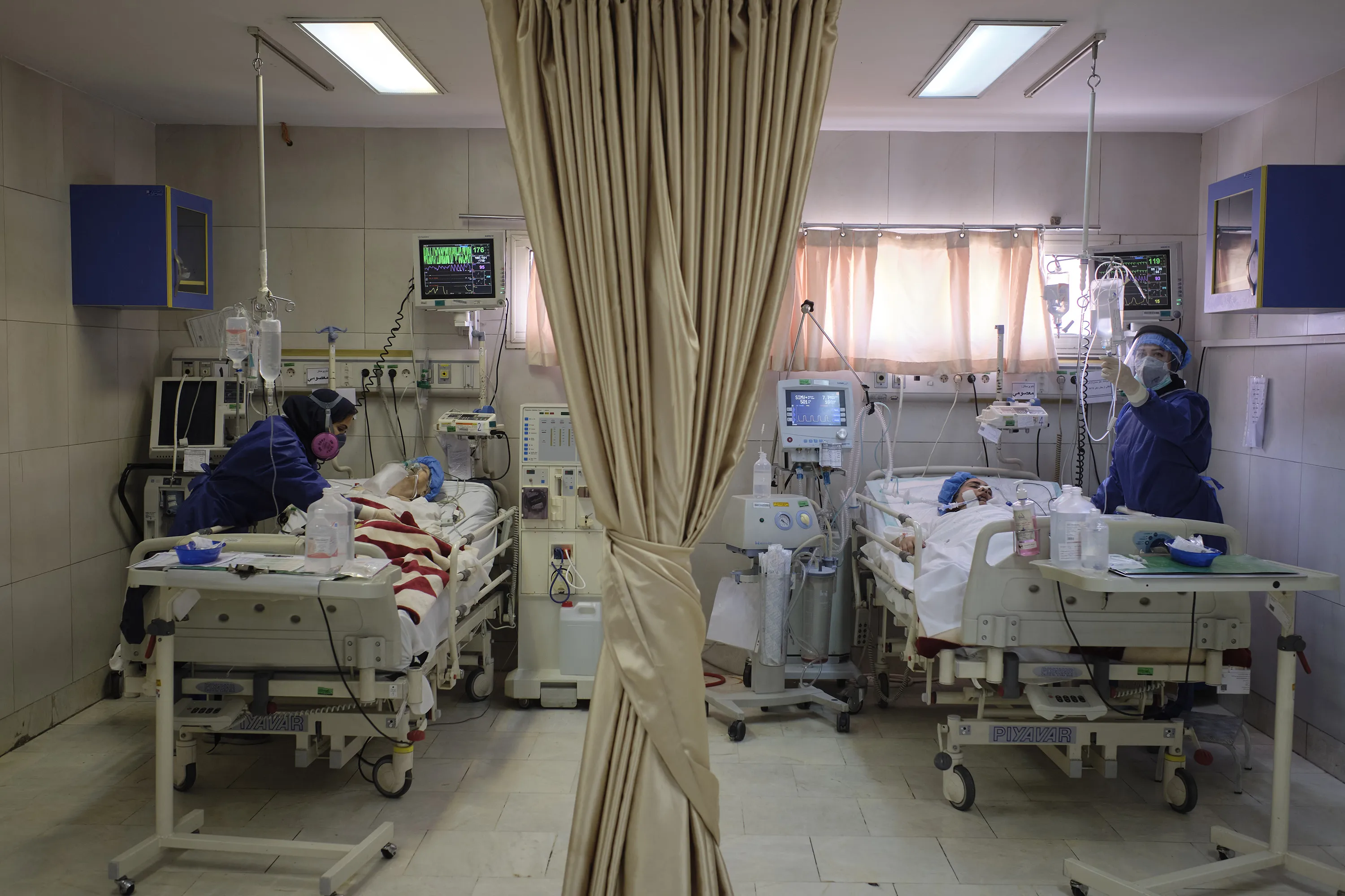 Medical personnel attend to patients&nbsp;in a COVID-19 section of a hospital inTehran on Oct.&nbsp; 6.