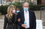 Bill Gross and his girlfriend Amy Schwartz arrive at state court in Santa Ana, Calif., on Dec. 7.