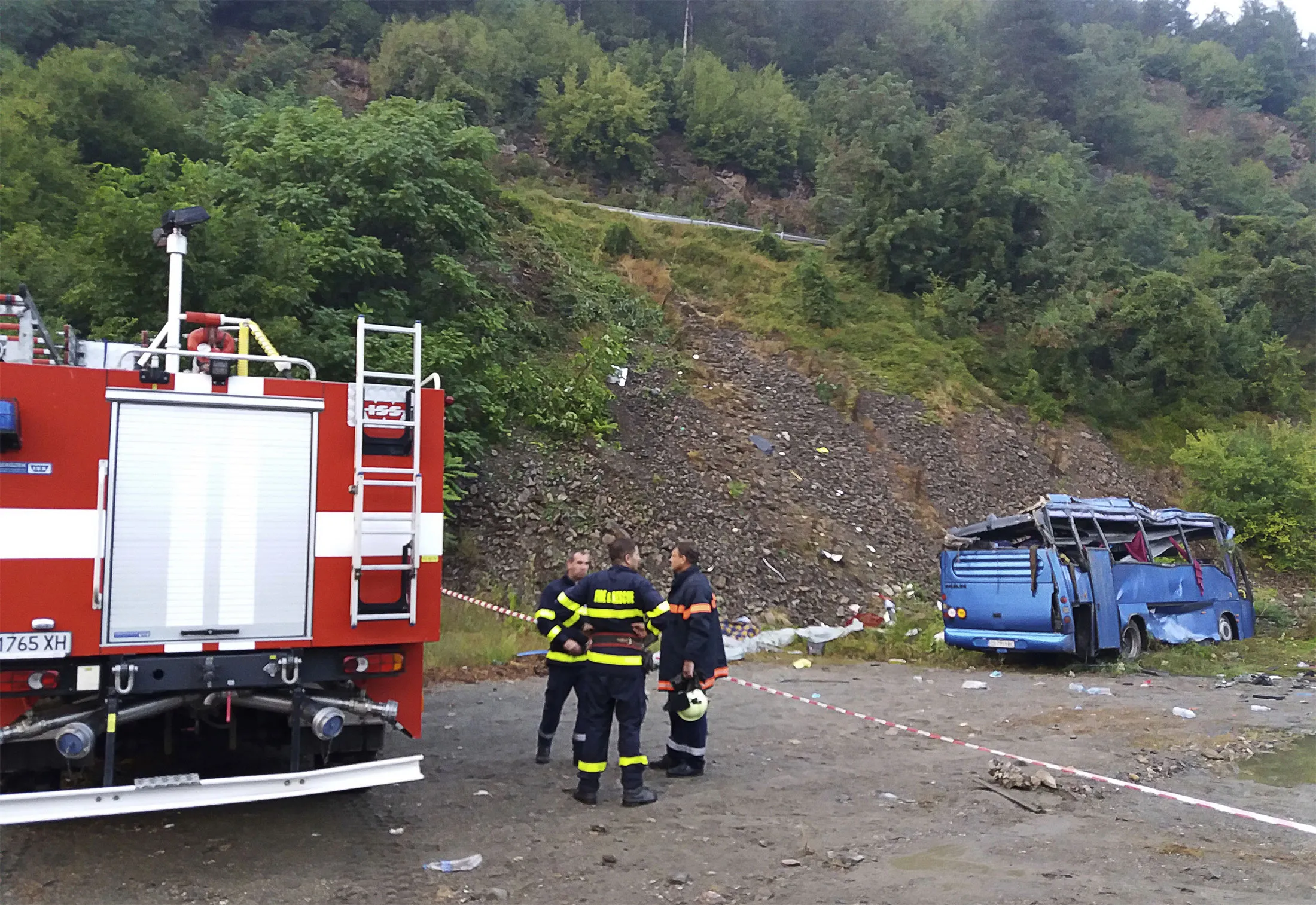 Firefighters near the scene of the&nbsp;bus crash on&nbsp;Aug. 25.&nbsp;