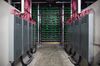 Cryptocurrency mining rigs sit on racks past power units at a Bitfarms facility in Saint-Hyacinthe, Quebec, Canada, on Thursday, July 26, 2018. Bitcoin has rallied more than 30 percent in July, shrugging off security and regulatory concerns that have plagued the virtual currency for much of this year.