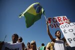 Protesters calling for the impeachment of President Dilma Rousseff march along Copacabana beach on Aug. 16, 2015.
