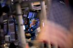 A trader works on the floor of the New York Stock Exchange (NYSE) in New York, U.S.