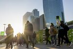 Commuters in the La Defense financial district of Paris, France.