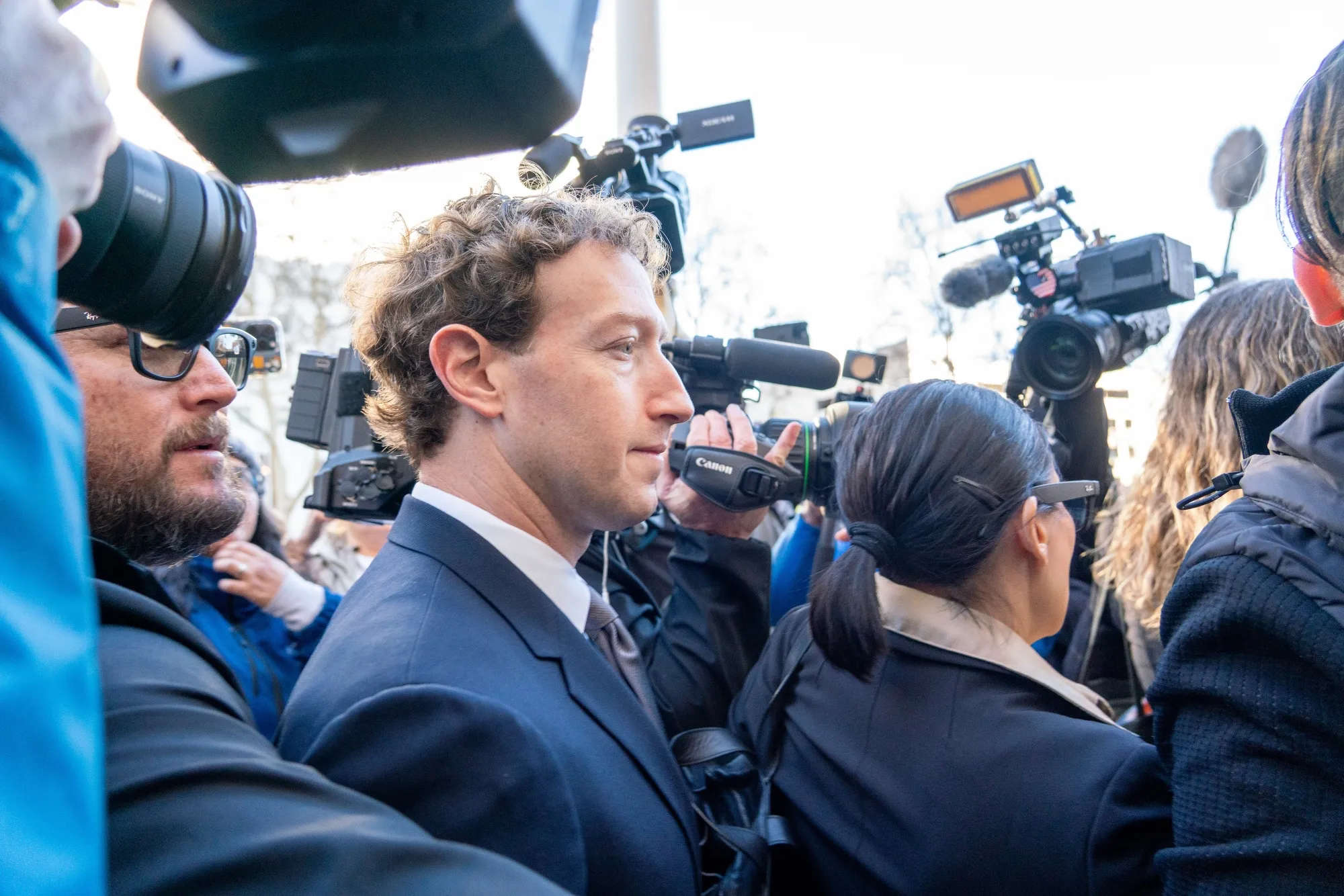 Mark Zuckerberg, chief executive officer of Meta Platforms, arrives Wednesday at a Los Angeles courthouse to testify at a landmark trial over social media addiction.