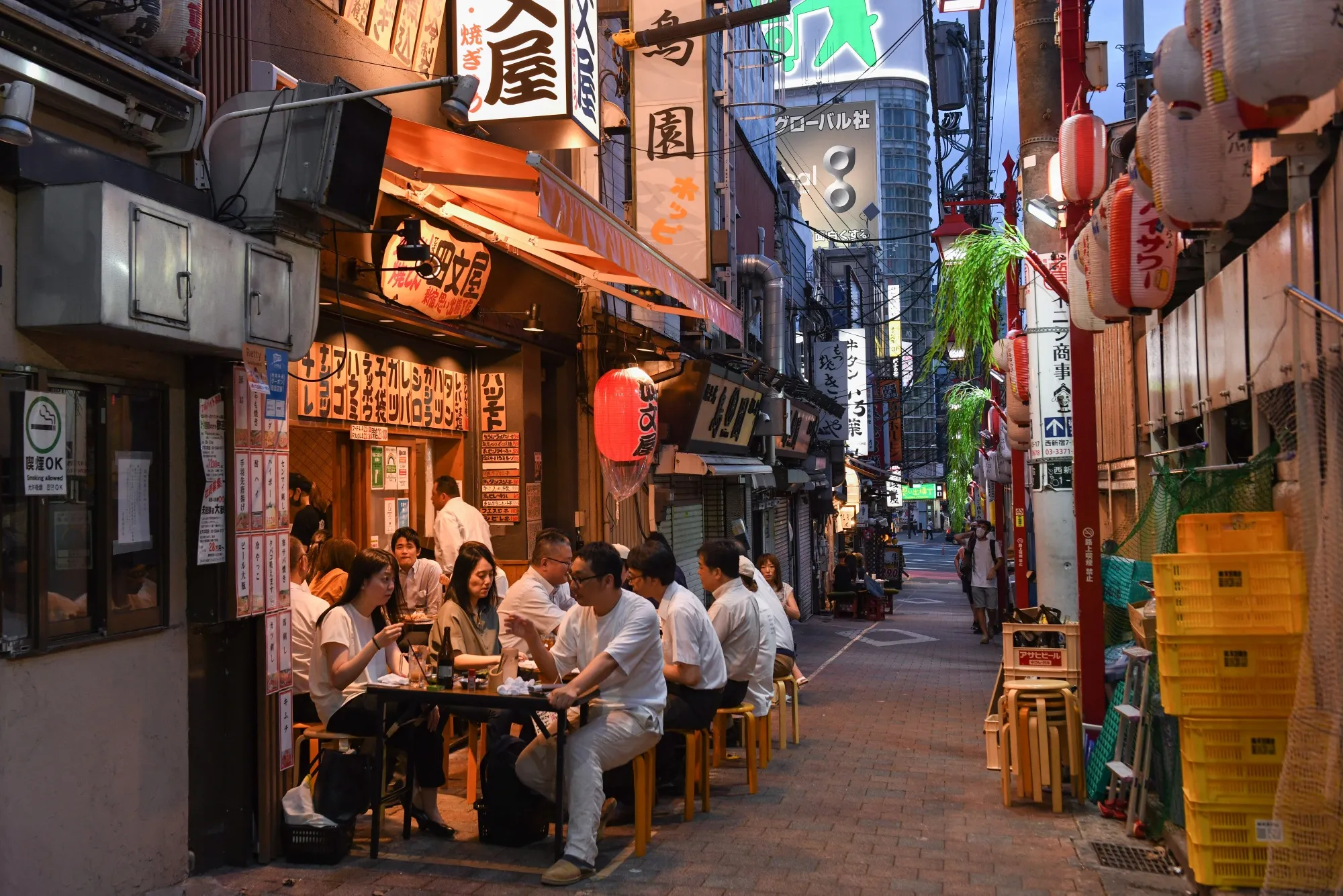 Customers at a bar in the Shinjuku district of Tokyo.