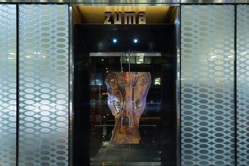 The gleaming, clublike entrance to Zuma in Midtown Manhattan.