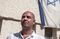 Tamir Gedo, chief executive officer of B.O.L. Pharma, Breath of Life, poses for a photograph beside an Israeli flag in Kfar Pines, Israel, on Wednesday, Sept. 21, 2016. XXX ADD SECOND SENTENCE XXX. Photographer: Rina Castelnuovo/Bloomberg
