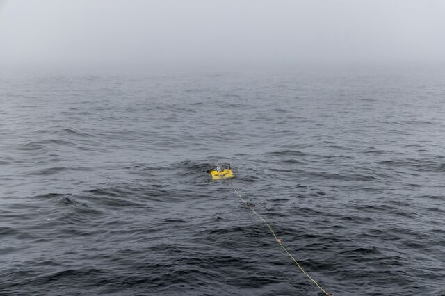 The MiniROV in the water, tethered to the Rachel Carson.