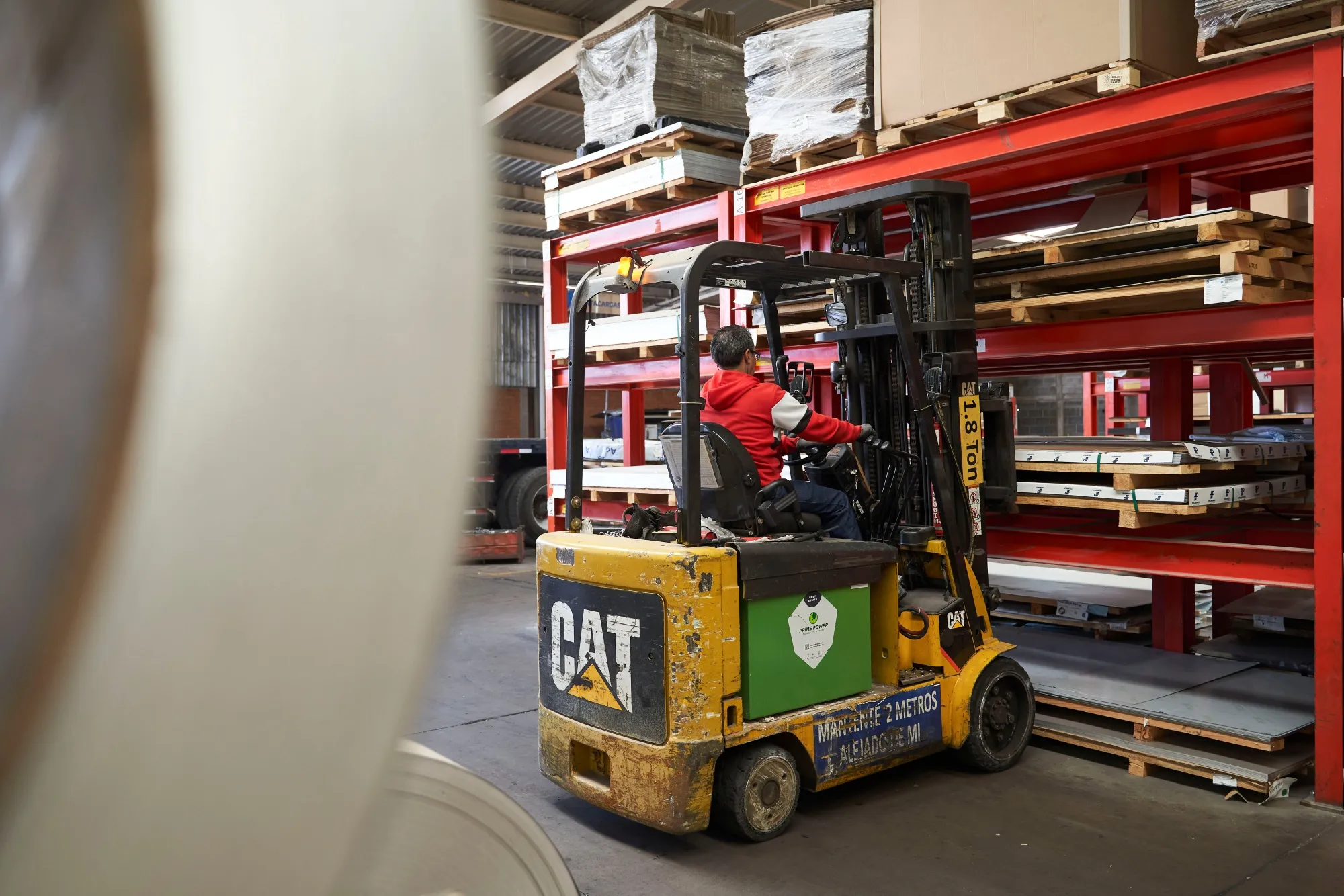 A worker uses a forklift to move steel and aluminum materials&nbsp;in Mexico.