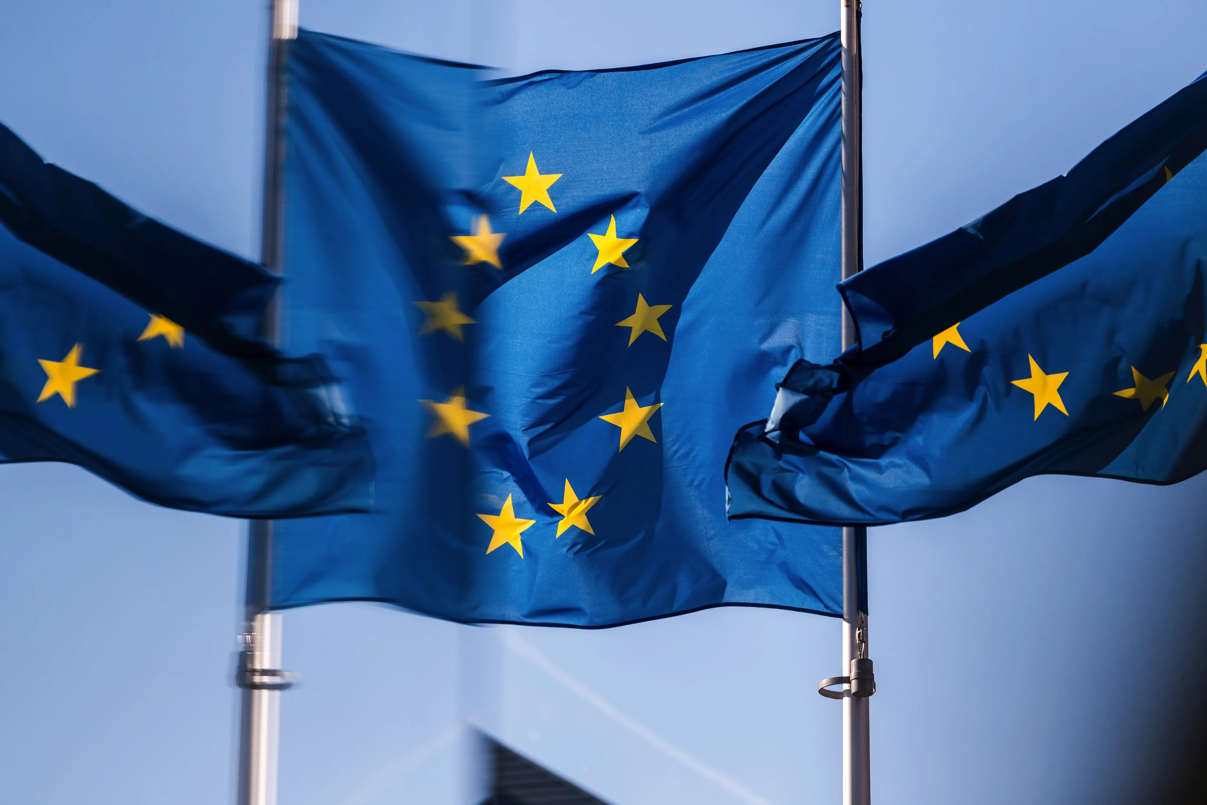 European Union (EU) flags fly near the Europa building in Brussels, Belgium, on Tuesday, Feb. 9, 2021. Ukraine is working to introduce more transparent regulation in the natural gas industry, where it also wants to strengthen links with the European Union.