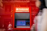 An automated teller machine (ATM) outside a Banco Santander SA bank branch in Madrid, Spain, on Wednesday, July 26, 2023. Banco Santander’s earnings beat estimates as its domestic market became the Spanish lender’s top profit maker for the first time in more than a decade, boosted by rising interest rates.