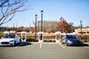 Tesla Inc. electric vehicles sit parked in front of charging stations, part of the Main Street North Brunswick development project, in North Brunswick, New Jersey, U.S., on Wednesday, Nov. 13, 2019. New Jersey Transit's first new station in almost two decades for the nation's busiest train line promises to ease Manhattan commutes, boost property values and unclog highways. But skeptics warn that the project could actually worsen congestion.