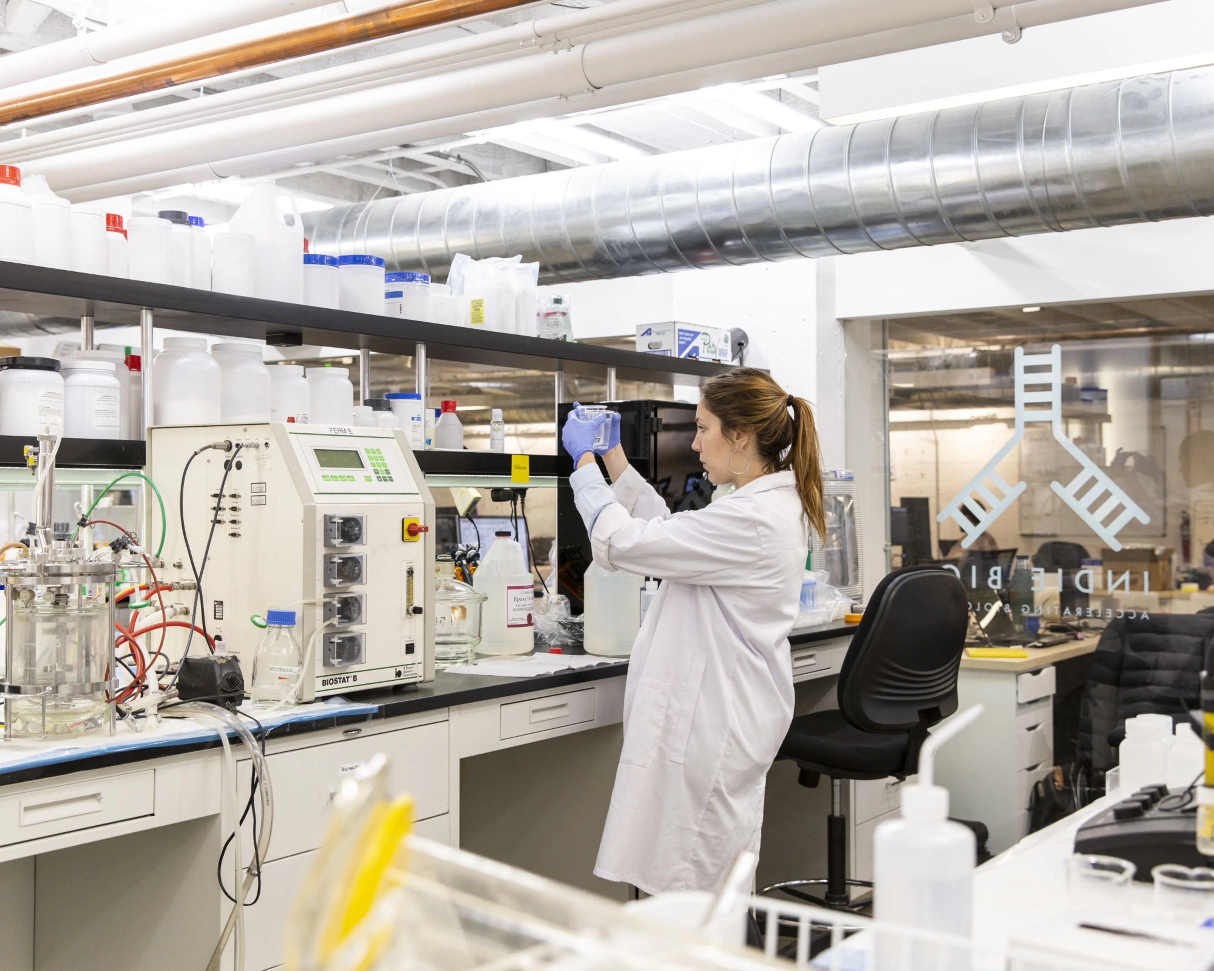 A technician works at the IndieBio laboratory and co-working space in San Francisco. As the life sciences sector booms, the market for lab space in cities like Boston and the Bay Area has heated up.&nbsp;