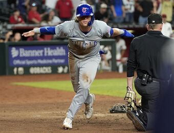 relates to Nico Hoerner's tying dash and go-ahead single rally Cubs past Diamondbacks 3-2 in 11 innings