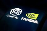 In this photo, the Nvidia and OpenAI logos appear on a smartphone reflecting an abstract illustration representing data flows. Nvidia and OpenAI unveil a strategic partnership to build next-generation artificial intelligence infrastructure in Creteil, France, on September 23, 2025. (Photo by Samuel Boivin/NurPhoto via Getty Images)