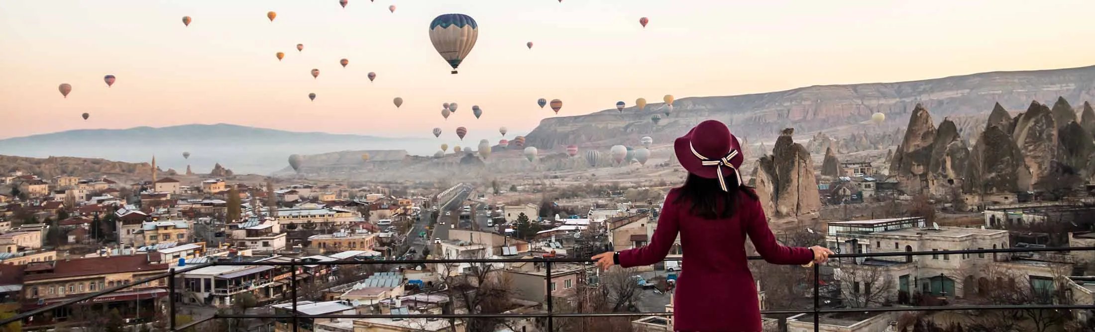 Woman Watching Hot Air Balloons in Cappadocia