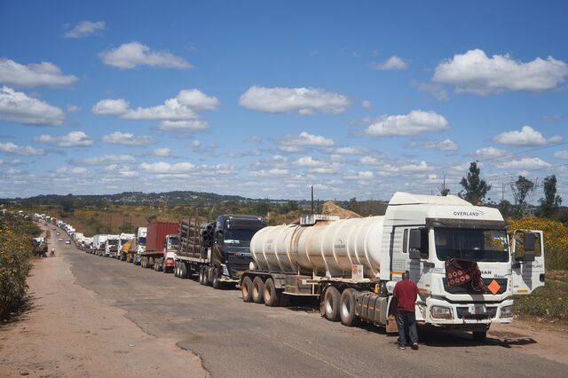 Trucks wait in a days-long queue to cross into Congo from Zambia
