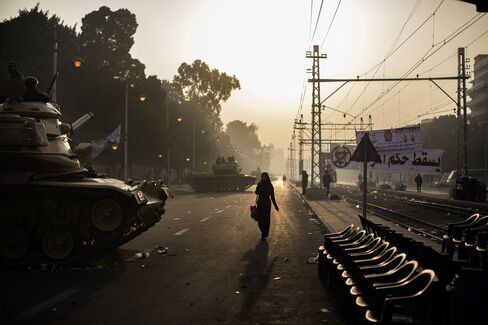 Egypt Turmoil Puts IMF Cash at Risk as Mursi Halts Tax Rises