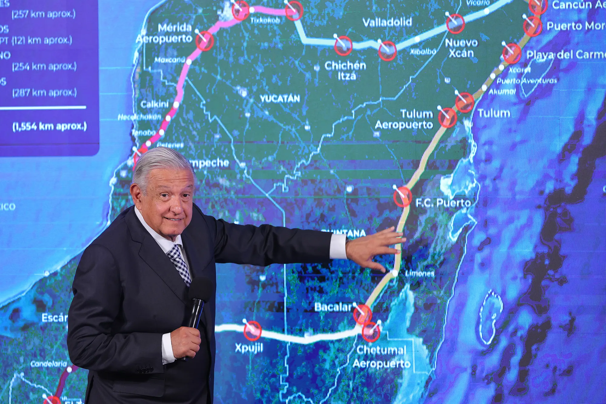 Andres Manuel Lopez Obrador shows a map with the route of the Maya Train, on June 28.