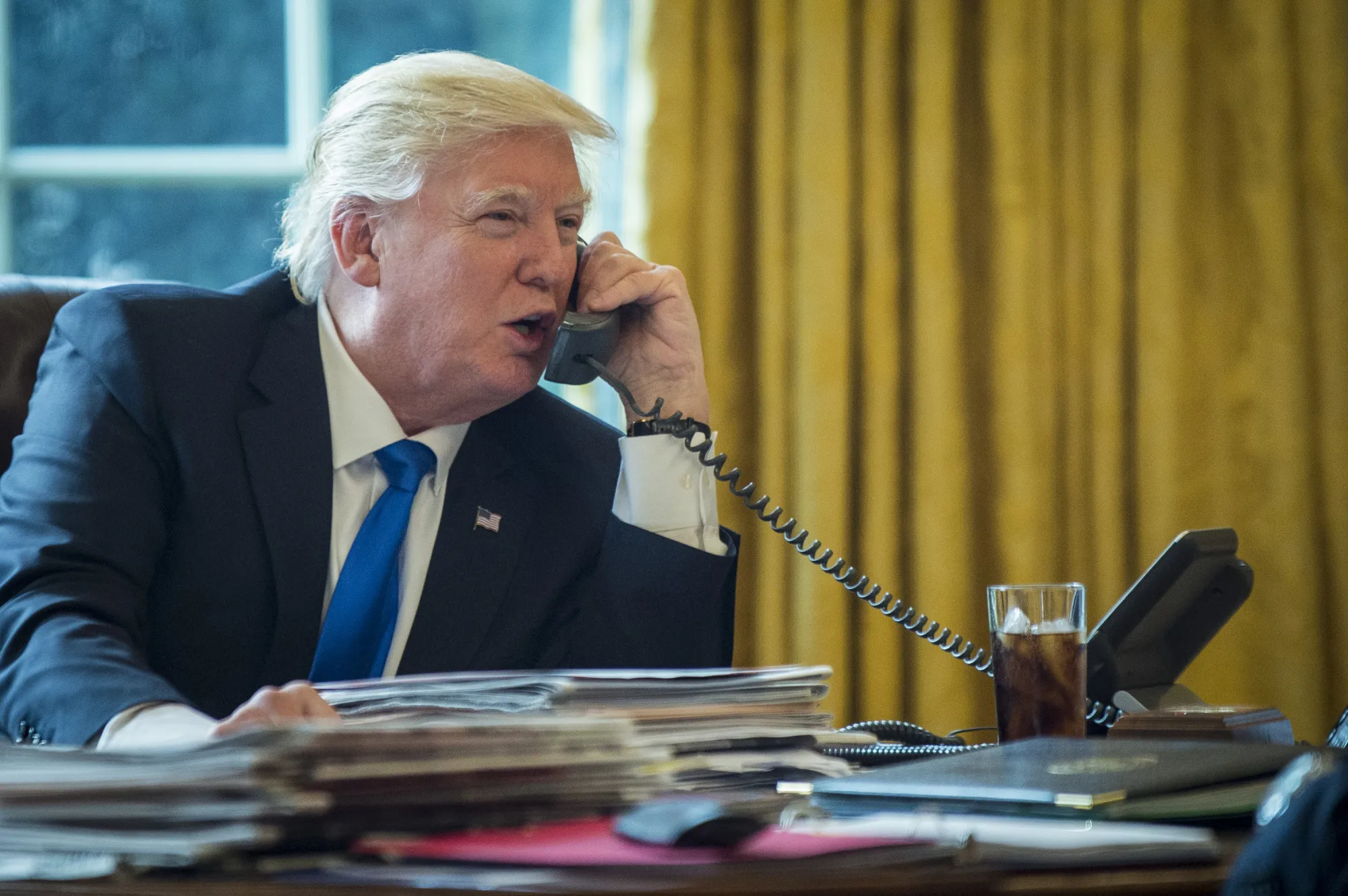 Then-President Donald Trump speaks on the phone with Russian President Vladimir Putin in the Oval Office&nbsp;in 2017.