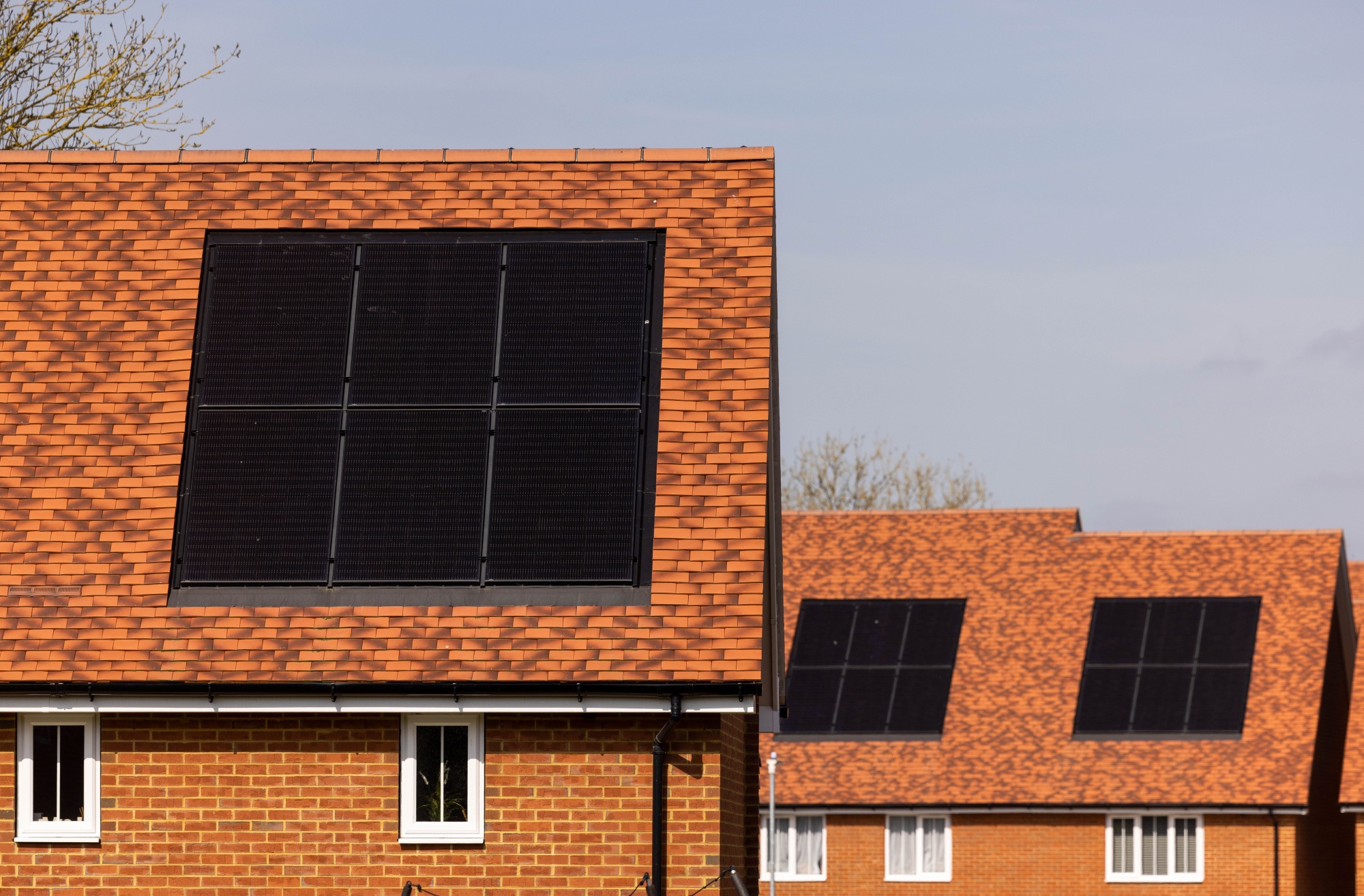 Photovoltaic solar panels on homes in Lenham, UK.