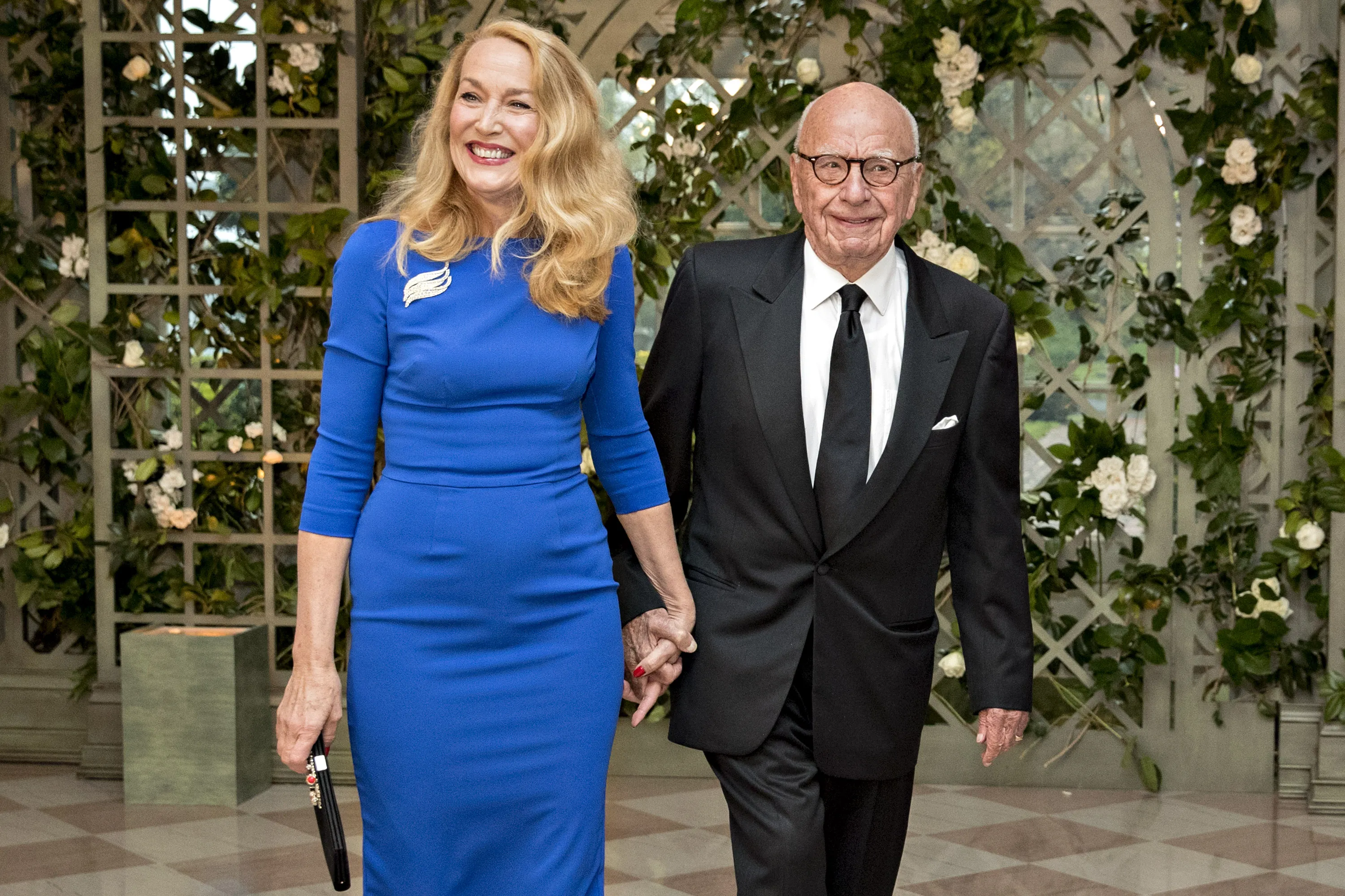 Rupert Murdoch, co-chairman and founder of Twenty-First Century Fox Inc., right, and Jerry Hall arrive for a state dinner in honor of French President Emmanuel Macron at the White House on&nbsp;April 24.&nbsp;