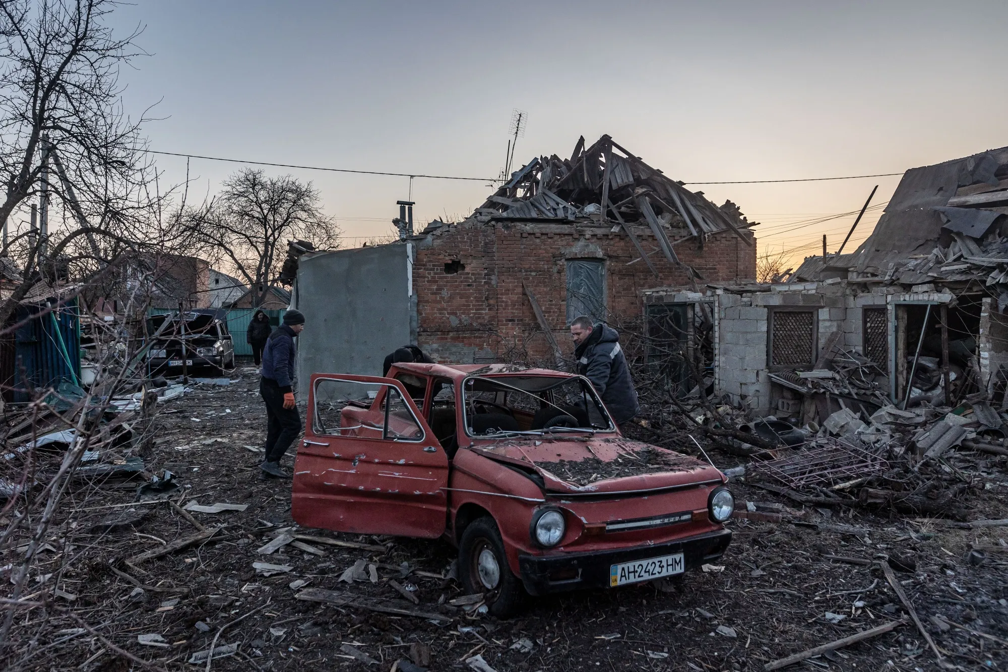 Residents look through debris after Russian shelling&nbsp;in Kostiantynivka, Ukraine on March 7.