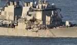 US Navy guided missile destroyer USS Fitzgerald arrves at its mother port US Naval Yokosuka Base, Kanagawa prefecture on June 17, 2017.
