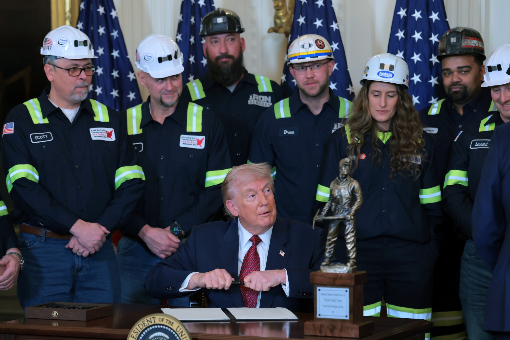 President Donald Trump signing an executive order during an event on the use of coal in the East Room of the White House in February. Photographer: Anna Moneymaker/Getty Images
