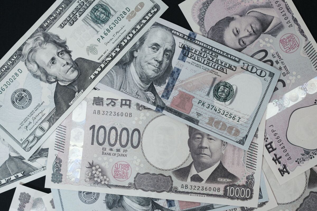 Yen Drops Against Dollar After BOJ Raises Rates as Expected