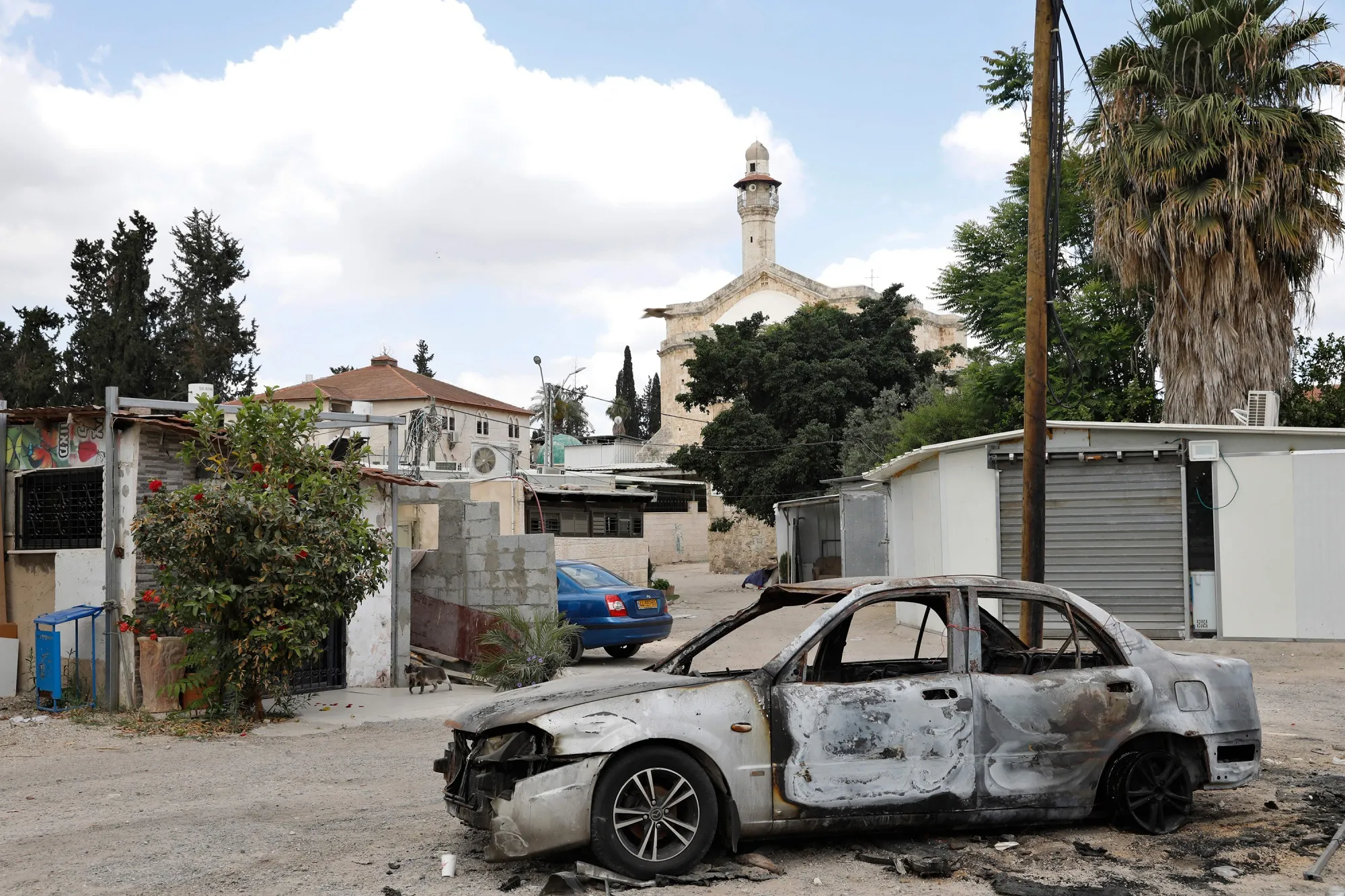A burned out car in Lod on May 23.
