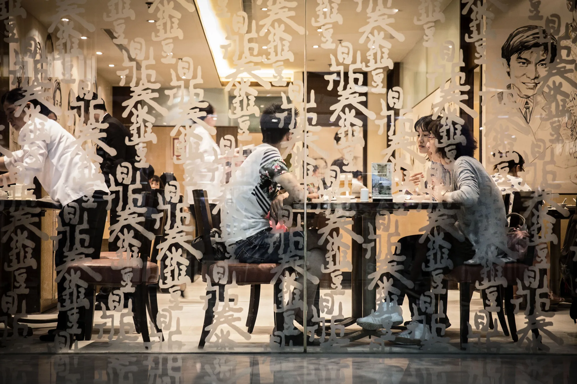 Customers dine inside a Din Tai Fung dumpling restaurant in Shangha.