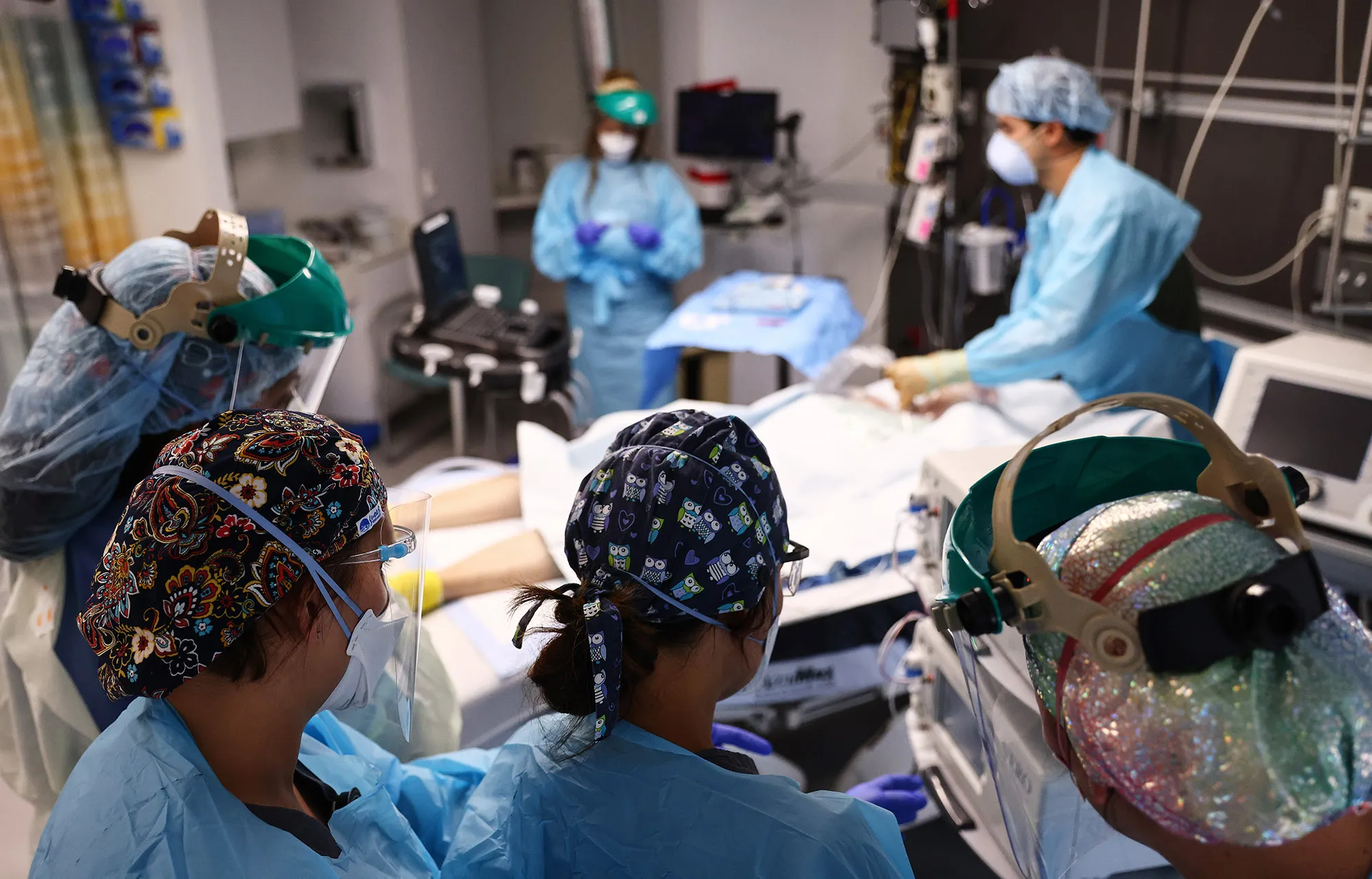 Clinicians work with&nbsp;a Covid-19 patient in the Intensive Care Unit at Lake Charles Memorial Hospital in Lake Charles, Louisiana. on Aug. 10.