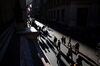 Pedestrians walk along Wall Street near the New York Stock Exchange (NYSE) in New York.